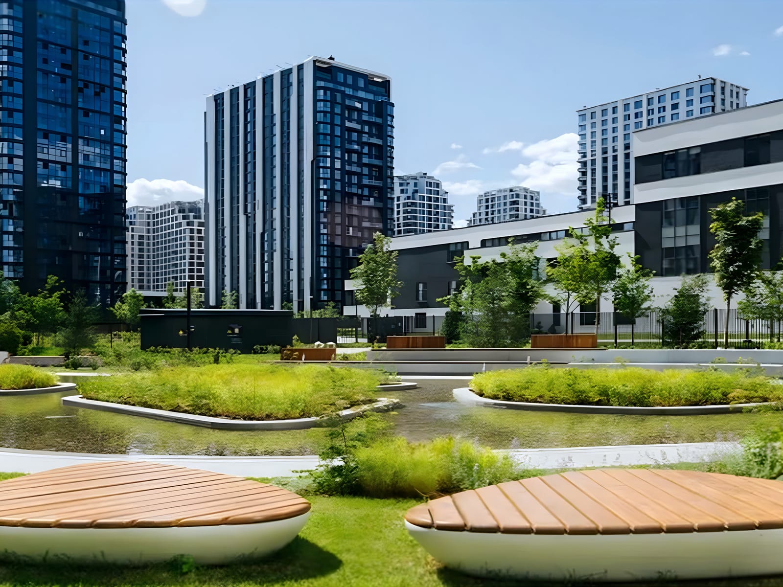 High-rise residential towers behind a landscaped water garden at the DONSTROY development, Moscow