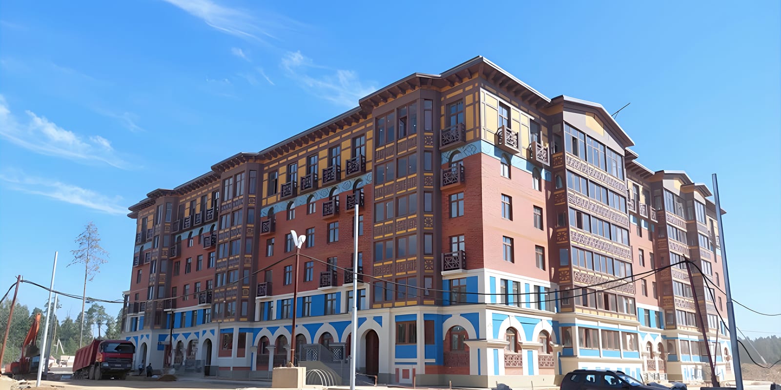 Brick and blue neoclassical residential block, blue sky